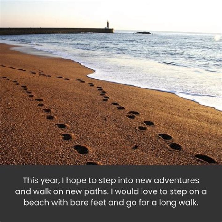 Calvin Harris was spotted having a walk on the beach whilst on holiday. 