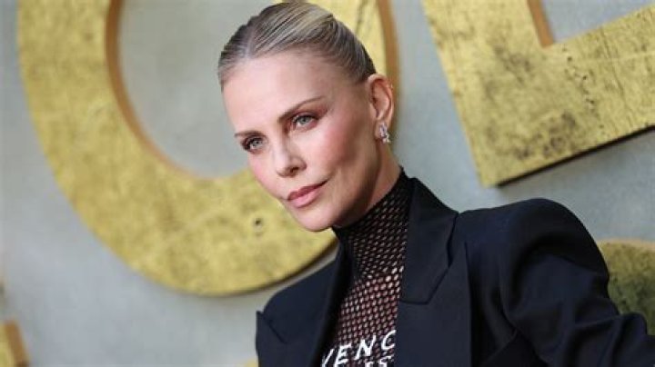 Charlize Theron Turns Heads at the 2020 Oscars in Unique Black Dress