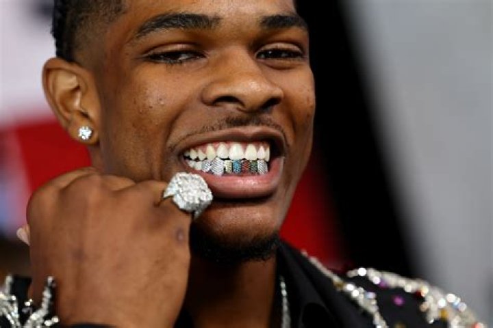 Rappers With And Without Teeth Grillz