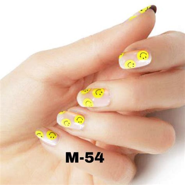 Smiley Face Manicures Are 2021's Biggest Nail Trend