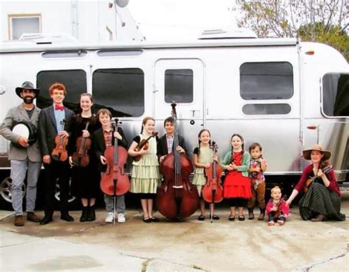 The Happy Caravan Income: How a Musical Family Shares Their Journey and Earns